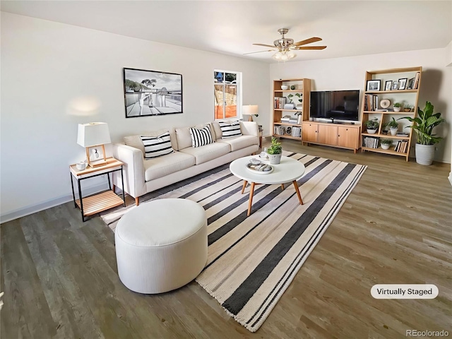 1298 S Seneca Way, Denver, CO 80223 - living area with wood finished floors and a ceiling fan