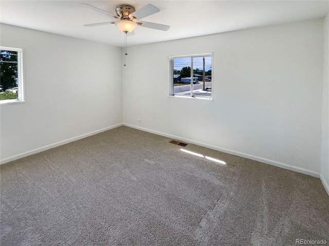 1298 S Seneca Way, Denver, CO 80223 - unfurnished room featuring carpet and a ceiling fan