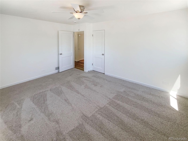 1298 S Seneca Way, Denver, CO 80223 - unfurnished room featuring a ceiling fan and carpet