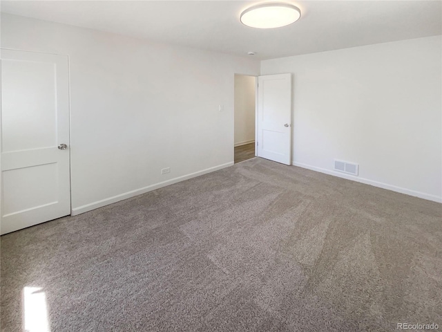 1298 S Seneca Way, Denver, CO 80223 - carpeted spare room with baseboards