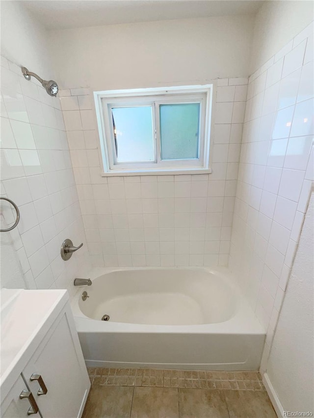 1298 S Seneca Way, Denver, CO 80223 - bathroom featuring tile patterned flooring, bathtub / shower combination, and vanity