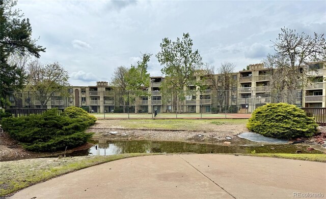 view of property's community with fence