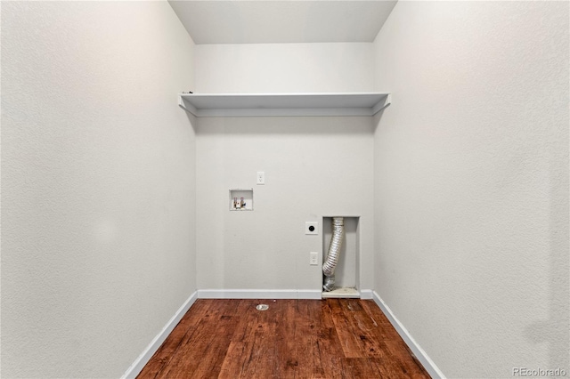 clothes washing area featuring electric dryer hookup, hardwood / wood-style floors, and hookup for a washing machine