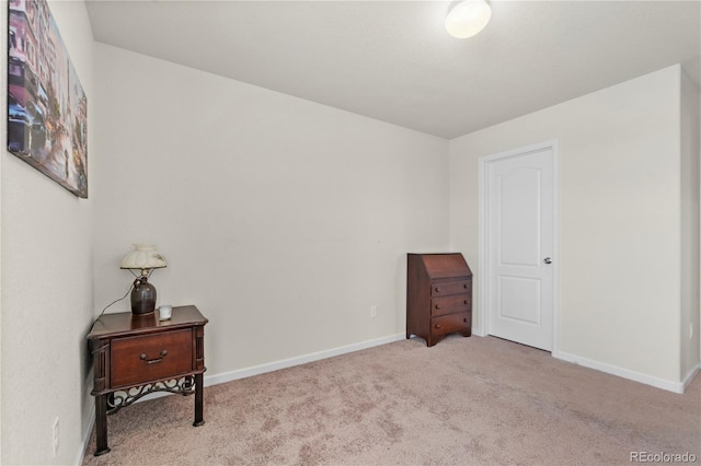 bedroom with light carpet