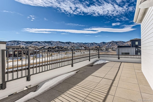 wooden terrace with a mountain view