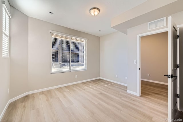 empty room featuring light hardwood / wood-style flooring