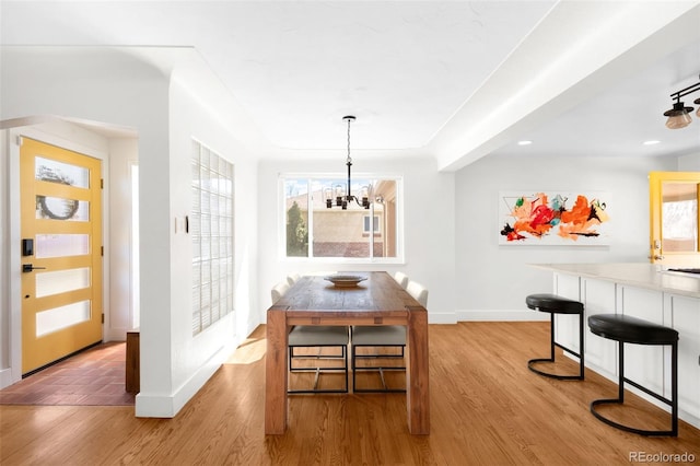 3925 Newland St, Wheat Ridge, CO 80033 - dining area with baseboards, light wood-style floors, a chandelier, and recessed lighting