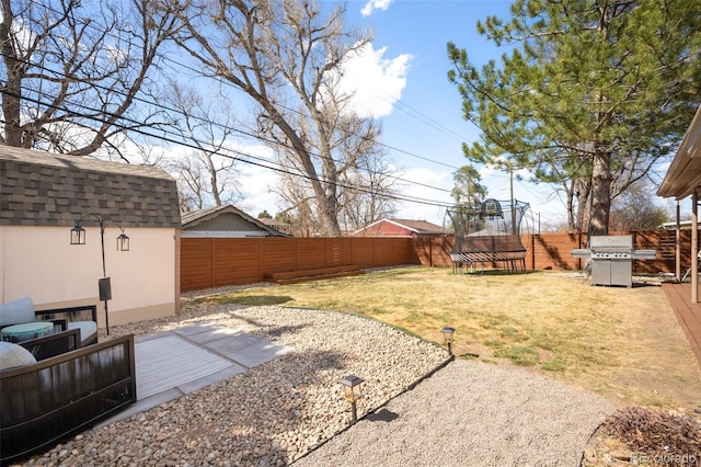 3925 Newland St, Wheat Ridge, CO 80033 - view of yard with a trampoline and a deck