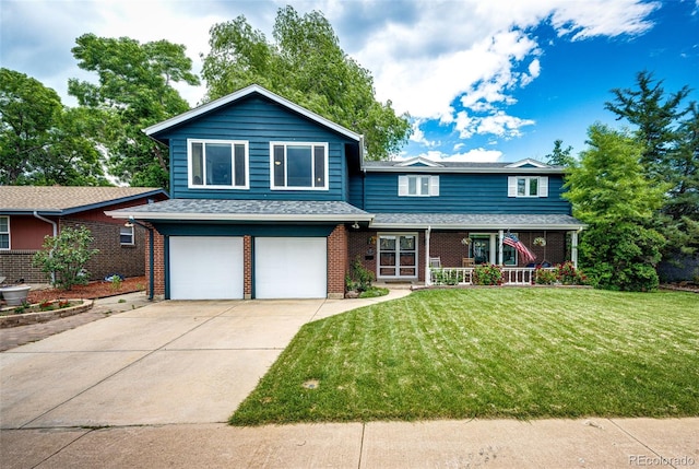 4645 W Temple Pl, Denver, CO 80236 - view of front of home with covered porch, a garage, brick siding, a front yard, and concrete driveway