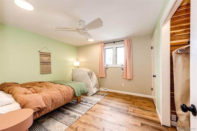 4645 W Temple Pl, Denver, CO 80236 - bedroom featuring wood finished floors, a closet, and a ceiling fan
