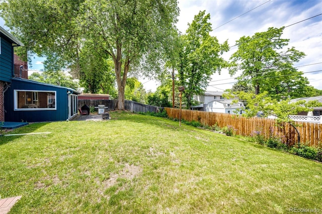 4645 W Temple Pl, Denver, CO 80236 - fenced backyard featuring a patio