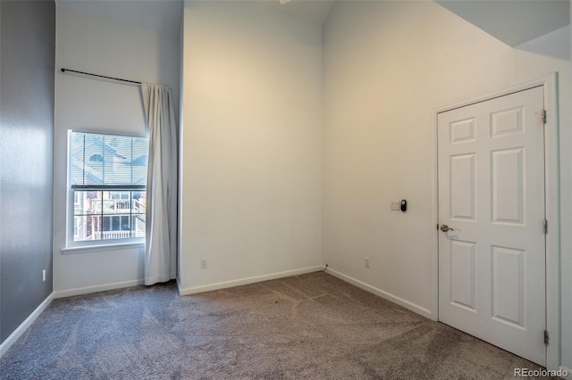 4943 S Carson St Unit 207, Aurora, CO 80015 - unfurnished room with carpet floors