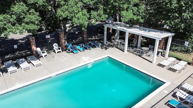 4943 S Carson St Unit 207, Aurora, CO 80015 - community pool featuring a pergola and a patio area