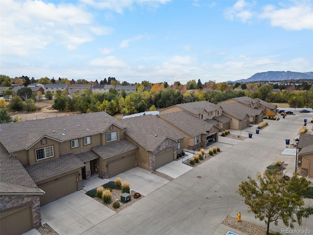 bird's eye view with a residential view and a mountain view