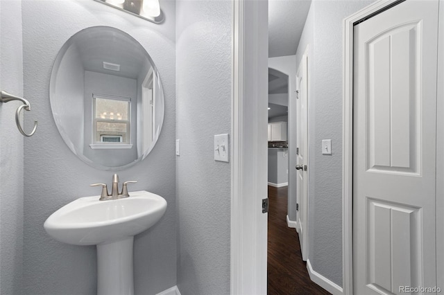 bathroom featuring hardwood / wood-style flooring