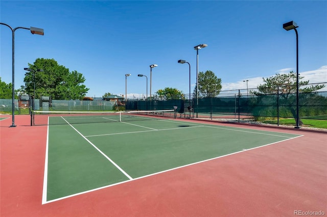 view of sport court featuring basketball hoop