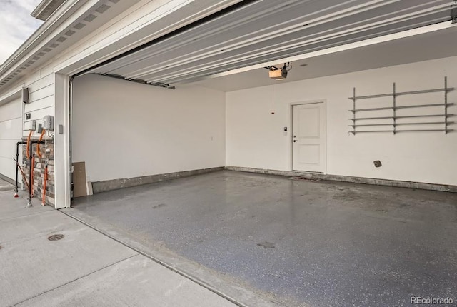 garage featuring a garage door opener