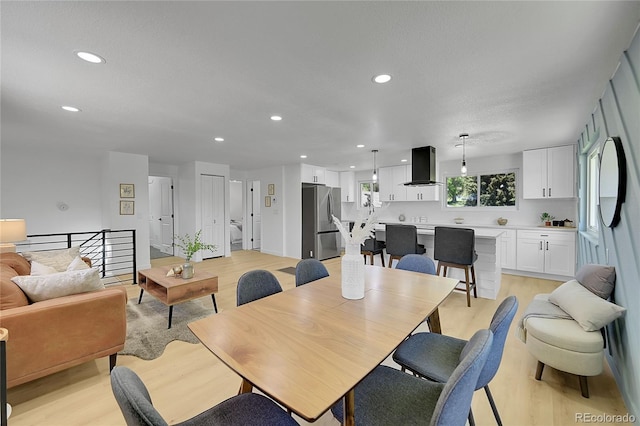 1173 Xenon St, Golden, CO 80401 - dining area featuring light wood finished floors and recessed lighting