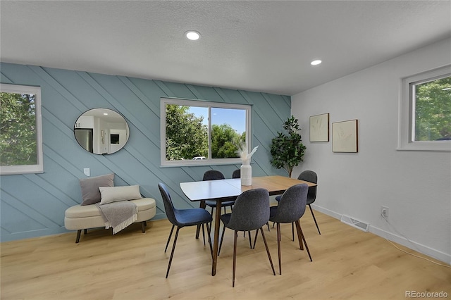 1173 Xenon St, Golden, CO 80401 - dining room with light wood-type flooring, baseboards, and recessed lighting