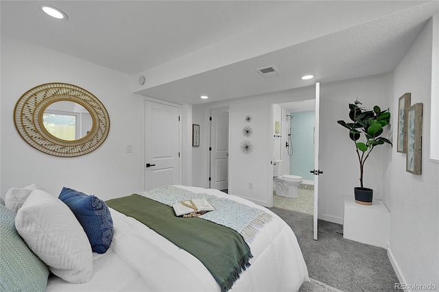 1173 Xenon St, Golden, CO 80401 - carpeted bedroom featuring baseboards, recessed lighting, and ensuite bathroom