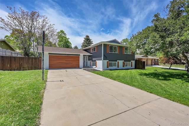 1173 Xenon St, Golden, CO 80401 - split level home with concrete driveway and a garage