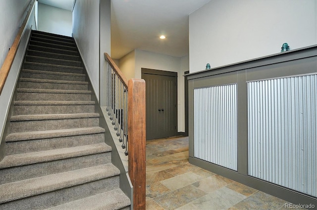 117 River Run Ct, Buena Vista, CO 81211 - stairway with stone finish floors and recessed lighting