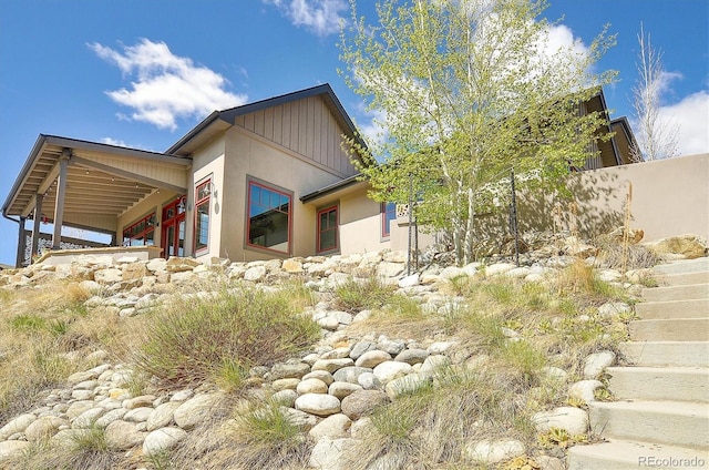117 River Run Ct, Buena Vista, CO 81211 - view of side of home with board and batten siding and stucco siding