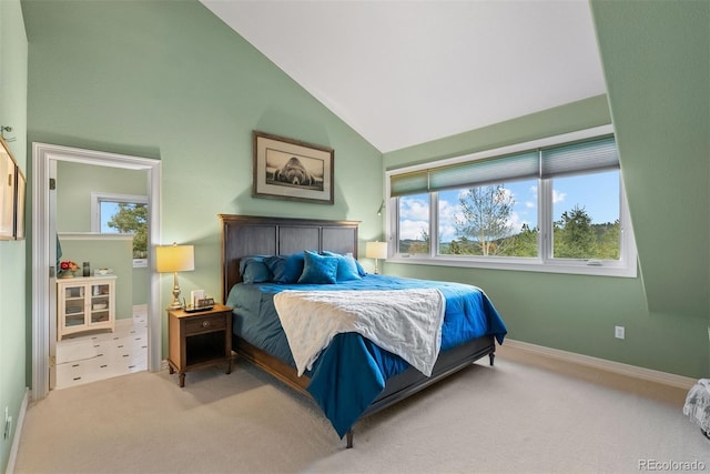 11406 Conifer Ridge Dr, Conifer, CO 80433 - bedroom with lofted ceiling, carpet, and baseboards
