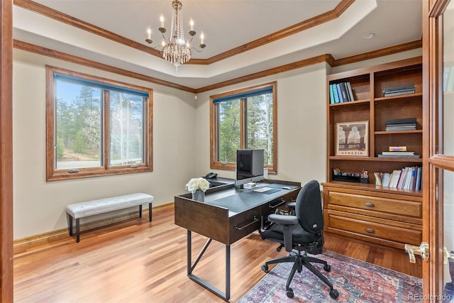 11406 Conifer Ridge Dr, Conifer, CO 80433 - office area featuring a chandelier, light wood-type flooring, crown molding, a tray ceiling, and baseboards