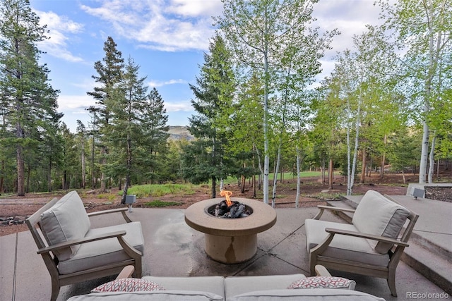 11406 Conifer Ridge Dr, Conifer, CO 80433 - view of patio with an outdoor fire pit