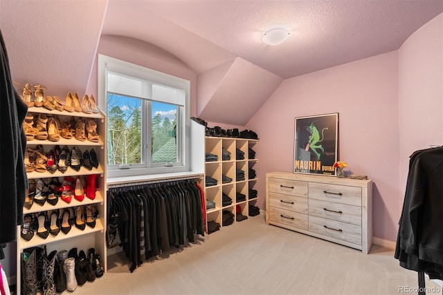 11406 Conifer Ridge Dr, Conifer, CO 80433 - walk in closet with carpet floors and vaulted ceiling