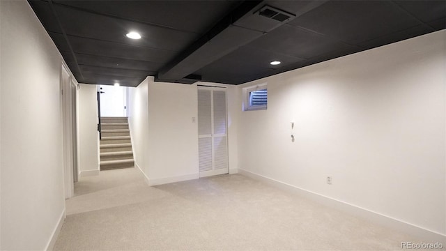 13833 W 68th Ave, Arvada, CO 80004 - finished below grade area with carpet floors, baseboards, recessed lighting, and stairway