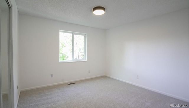 13833 W 68th Ave, Arvada, CO 80004 - carpeted empty room featuring baseboards