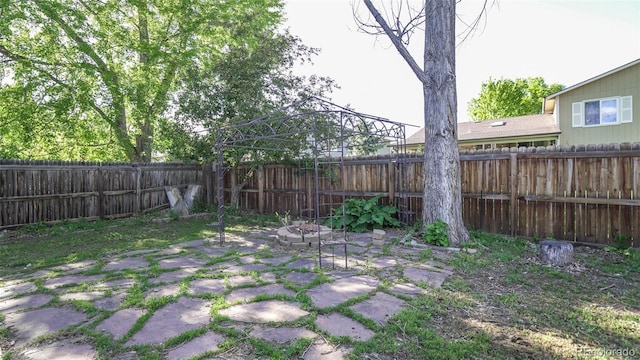 13833 W 68th Ave, Arvada, CO 80004 - fenced backyard featuring a fire pit