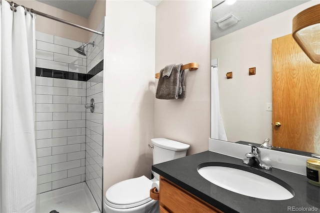 bathroom with a shower with curtain, vanity, and toilet