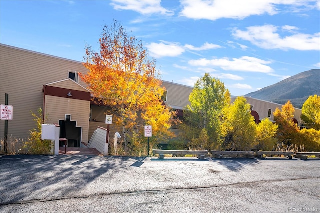 view of front of property with a mountain view