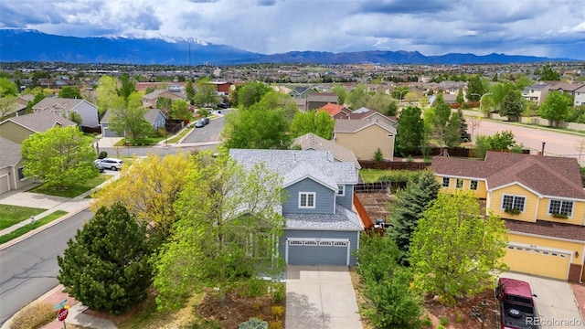 3618 Boot Spur Ct, Colorado Springs, CO 80922 - aerial view of residential area with mountains