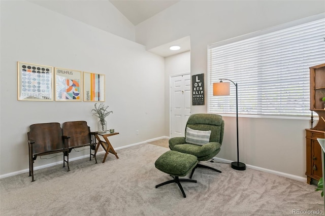 3618 Boot Spur Ct, Colorado Springs, CO 80922 - sitting room with carpet floors, baseboards, and vaulted ceiling