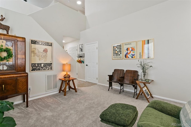 3618 Boot Spur Ct, Colorado Springs, CO 80922 - living area with carpet flooring, baseboards, and lofted ceiling