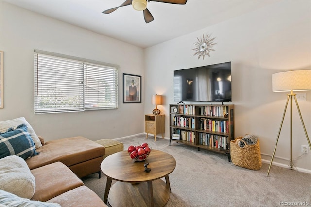 3618 Boot Spur Ct, Colorado Springs, CO 80922 - living room featuring a ceiling fan, baseboards, and carpet floors