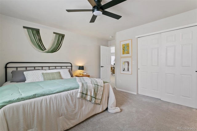 3618 Boot Spur Ct, Colorado Springs, CO 80922 - bedroom with carpet floors, a closet, a ceiling fan, and baseboards