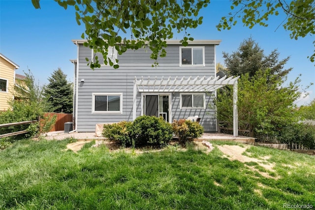 3618 Boot Spur Ct, Colorado Springs, CO 80922 - back of house with a pergola and central AC