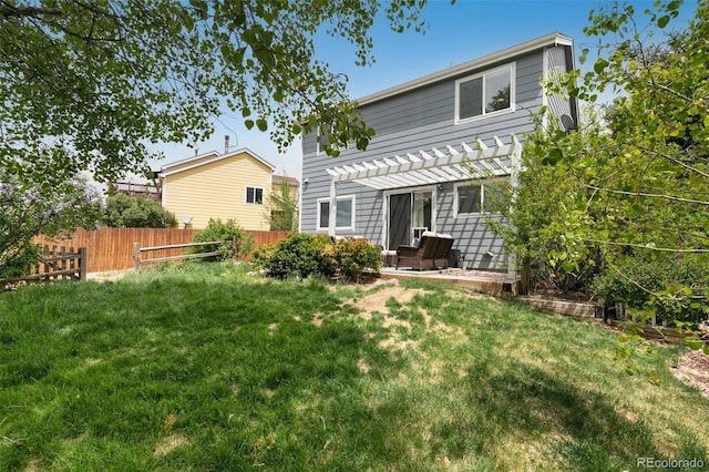 3618 Boot Spur Ct, Colorado Springs, CO 80922 - rear view of property featuring a pergola and a patio area