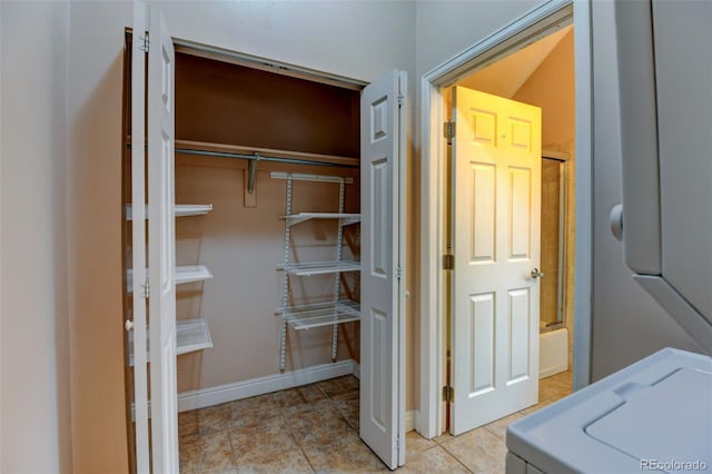 interior space with stacked washer / dryer