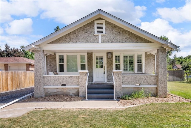 7340 W 32nd Ave, Wheat Ridge, CO 80033 - bungalow-style home featuring covered porch