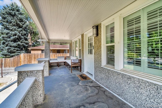 7340 W 32nd Ave, Wheat Ridge, CO 80033 - view of patio / terrace with an outdoor living space