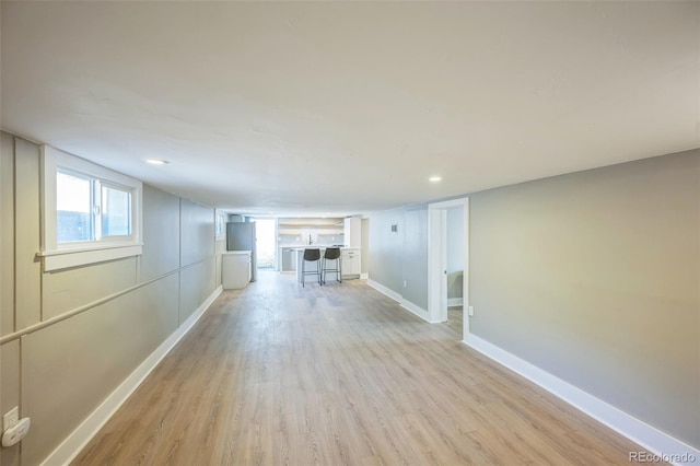 7340 W 32nd Ave, Wheat Ridge, CO 80033 - hall featuring light wood-style floors and baseboards