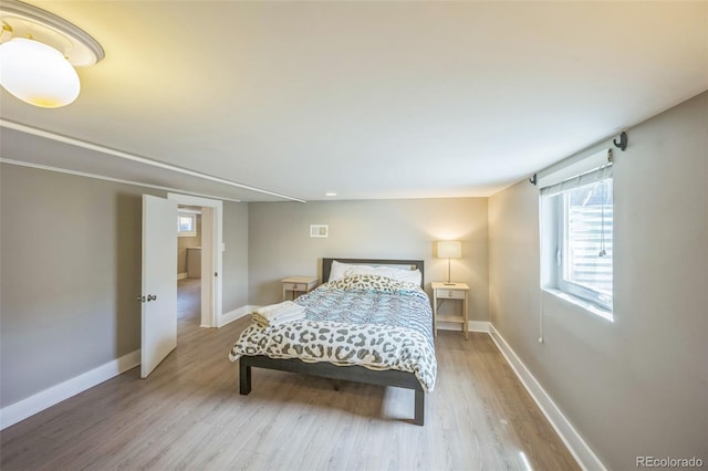 7340 W 32nd Ave, Wheat Ridge, CO 80033 - bedroom featuring wood finished floors and baseboards
