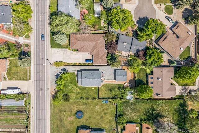 7340 W 32nd Ave, Wheat Ridge, CO 80033 - aerial view of property and surrounding area featuring nearby suburban area