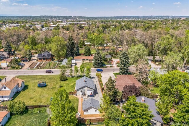 7340 W 32nd Ave, Wheat Ridge, CO 80033 - aerial perspective of suburban area with a tree filled landscape